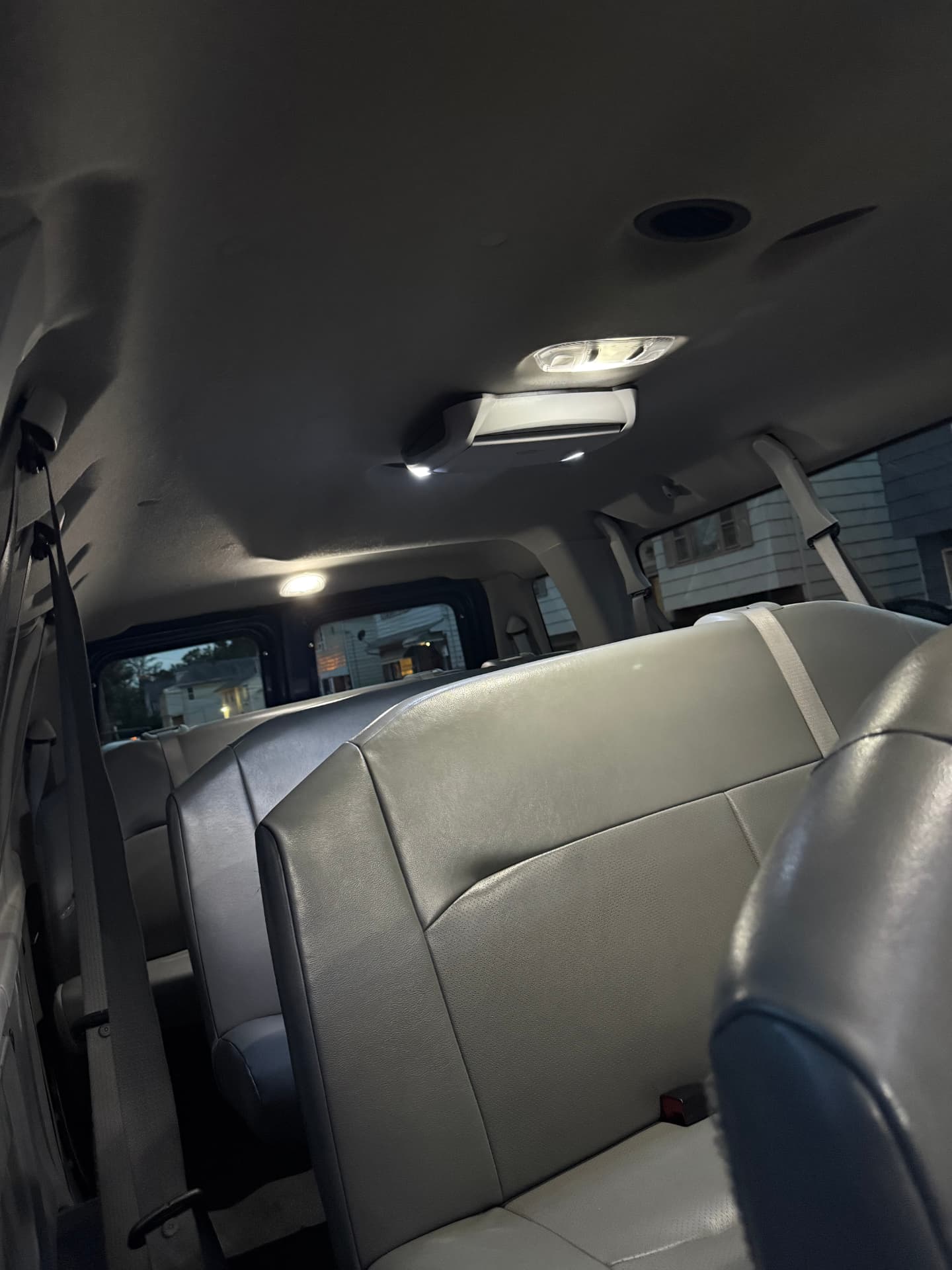 Spacious leather interior of a Platinum Charter & Tours passenger van